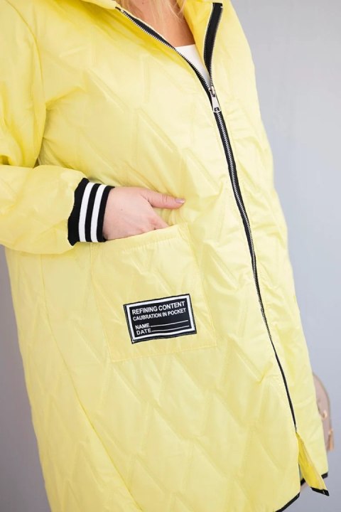 Kurtka damska Plus Size pikowana z kapturem i sportowymi mankietami żółta