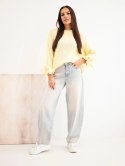 Sweter damski oversize z wiązaniami przy rękawach żółty
